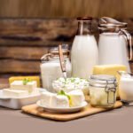 How do dairy processors address shelf-life challenges for fresh products?