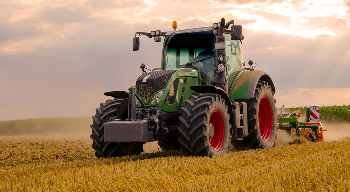 How can farmers reduce fuel consumption in tractors?